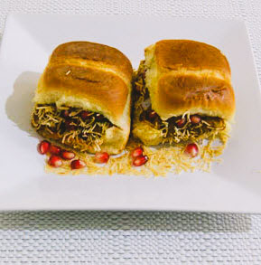 Dabeli is a very popular snack from the Western part of India. Dabeli is sweet, spicy, and with a taste of different chutneys. Dabeli you cannot resist and it will give you a quiet fill-up feeling.