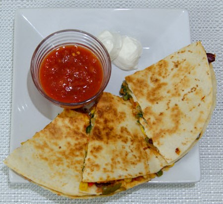 Vegetable Quesadillas are inspired by Mexican quesadillas. This recipe will give an Indian touch to popular Mexican quesadillas.